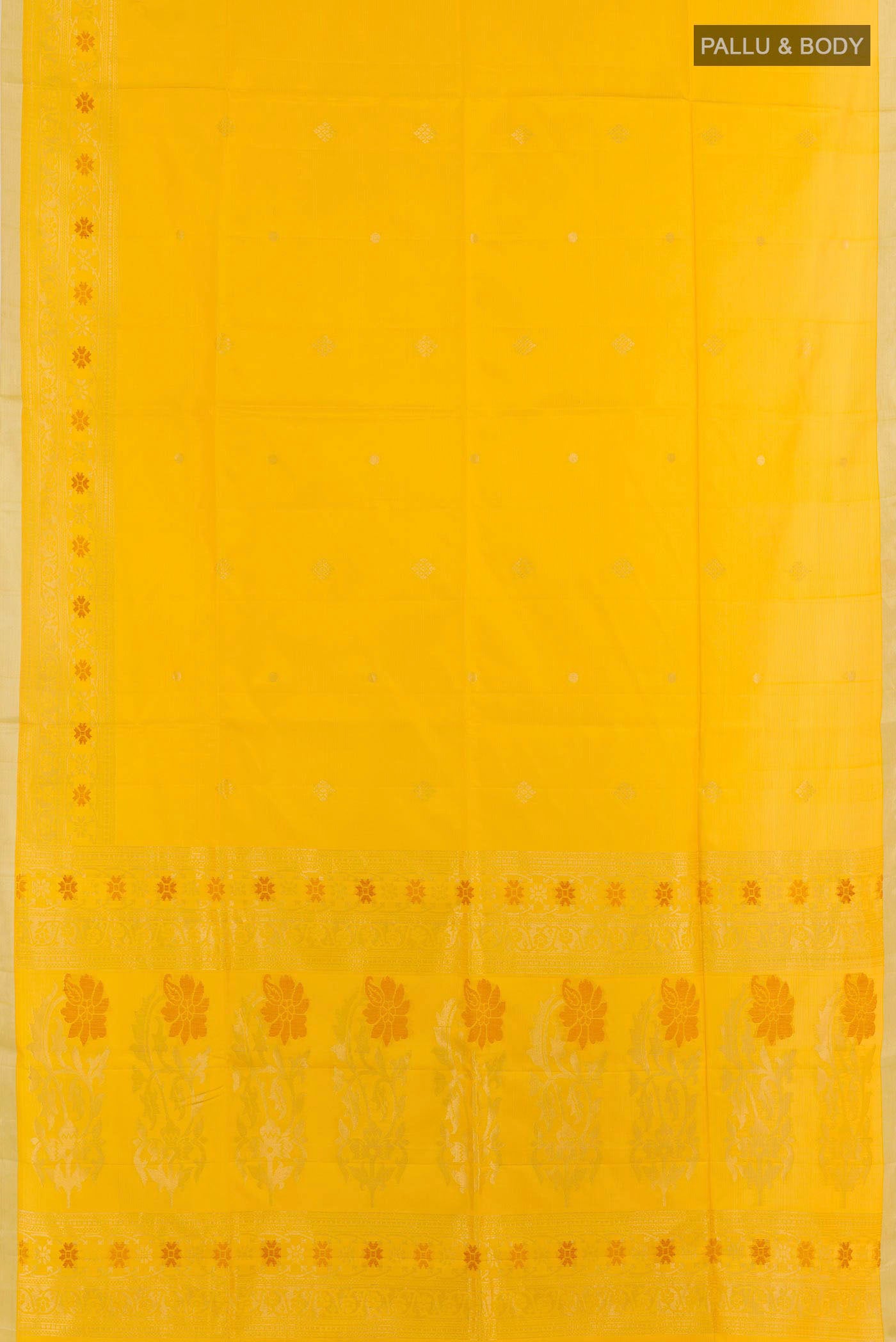 Flat view of Yellow Soft Silk Saree with Zari Butta on the body and Zari Border. 