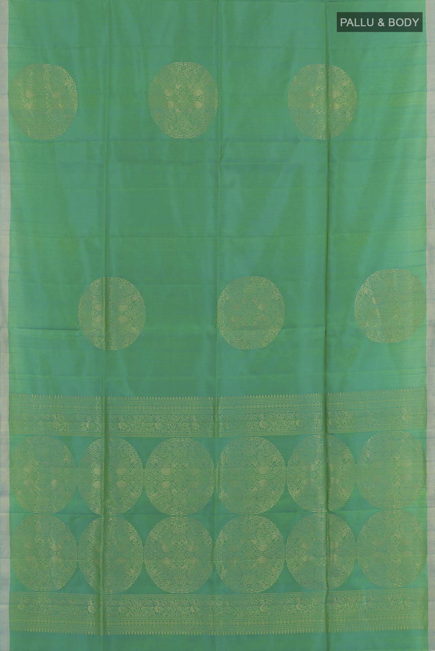Flat view of Sea Green Soft Silk Saree with Zari Butta on the body and Zari Border. 