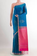 Peacock Blue Soft Silk Saree with Zari Butta on the body and Zari Border.  displayed on a mannequin