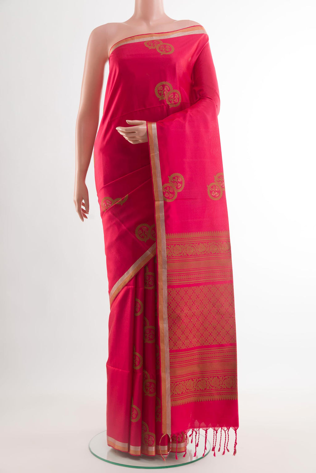 Pink Soft Silk Saree with Thread Butta on the body and Zari Border.  displayed on a mannequin