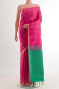 Sea Green Soft Silk Saree with Zari Butta on the body and Zari Border.  displayed on a mannequin