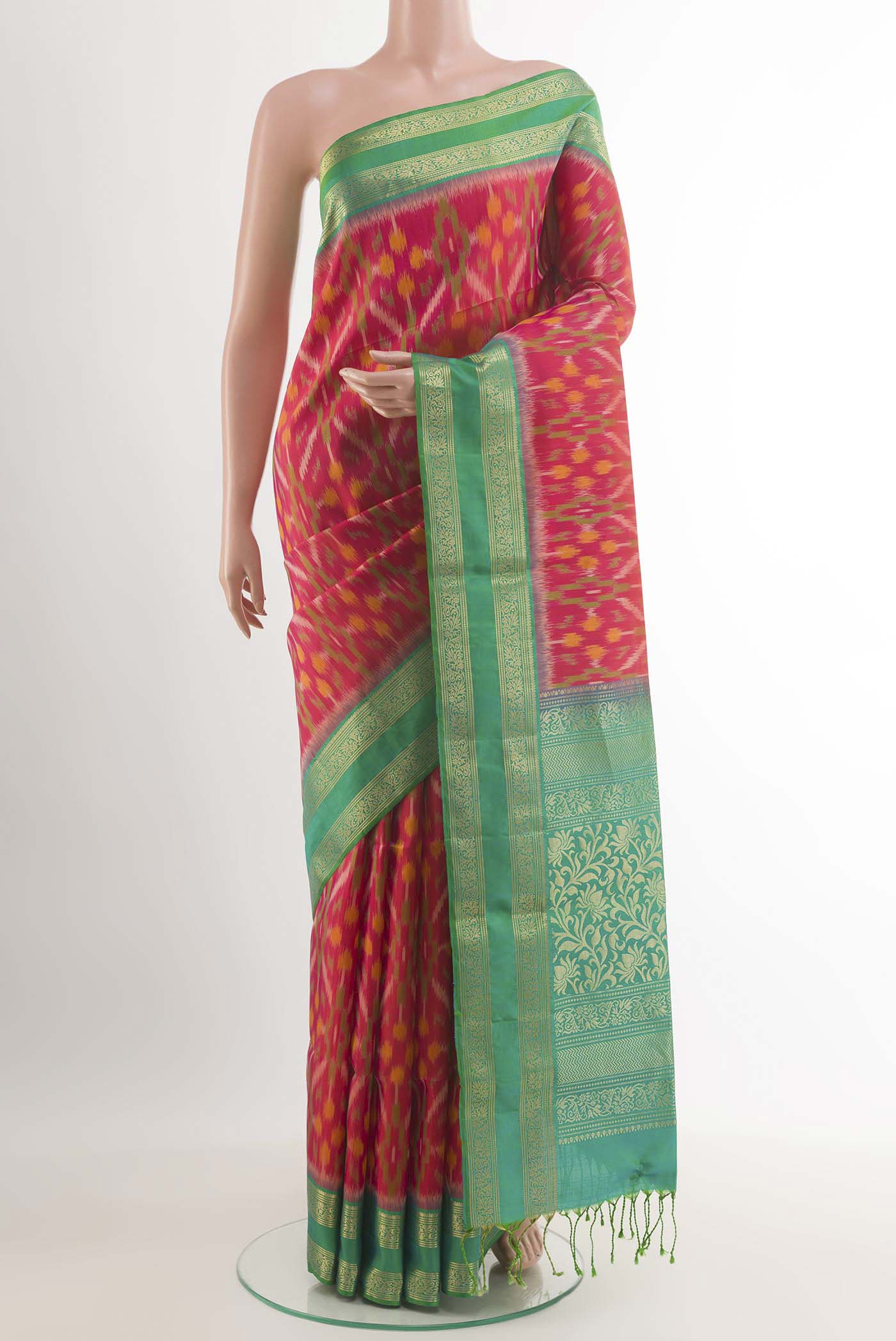 Pink Dual Tone Soft Silk Saree with Pure Ikat on the body and Zari Border.  displayed on a mannequin