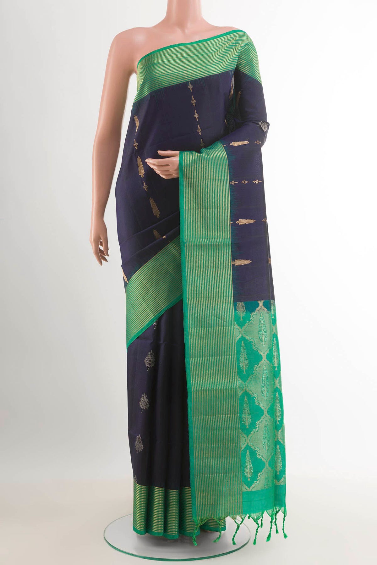 Dark Blue Dual Tone Soft Silk Saree with Zari Butta on the body and Zari Border.  displayed on a mannequin