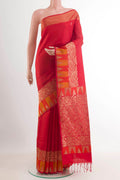 Red Soft Silk Saree with Plain Body and Zari Border.  displayed on a mannequin