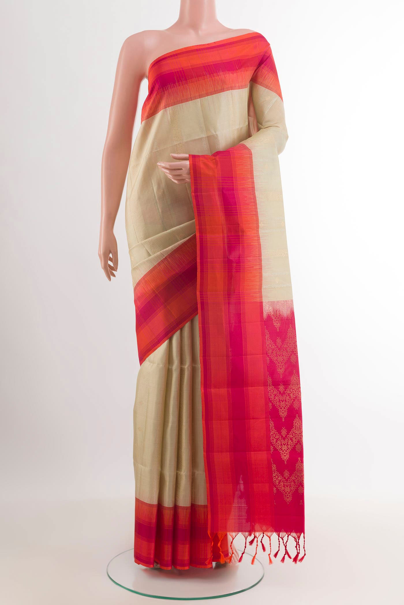 Off White Soft Silk Saree with Zari Butta on the body and Checks Border.  displayed on a mannequin