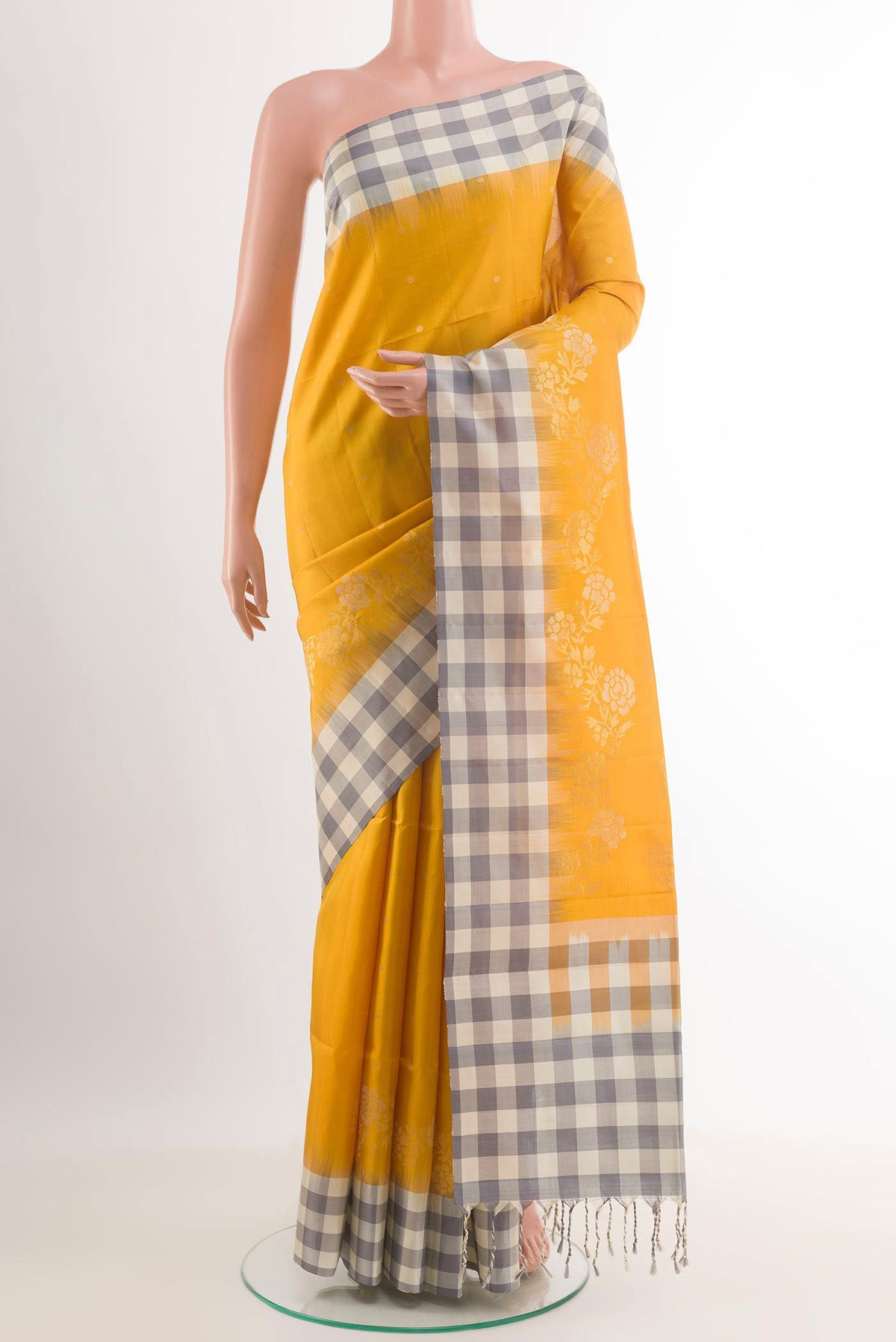 Yellow Dual Tone Soft Silk Saree with Zari Butta on the body and Zari Border.  displayed on a mannequin