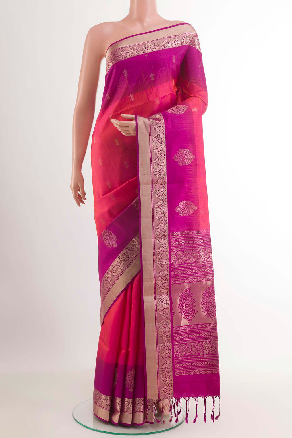 Pink Soft Silk Saree with Zari Butta on the body and Zari Border.  displayed on a mannequin