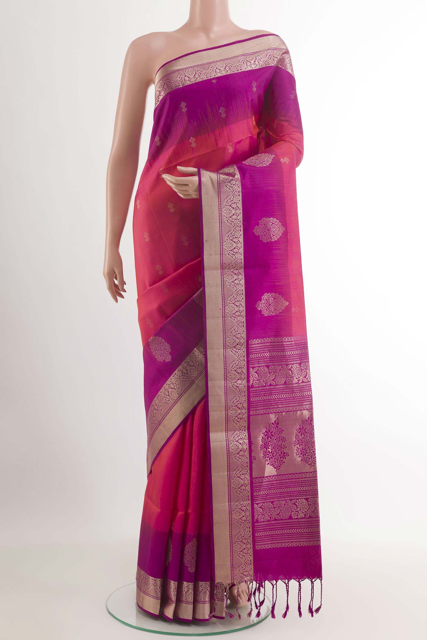 Pink Soft Silk Saree with Zari Butta on the body and Zari Border.  displayed on a mannequin