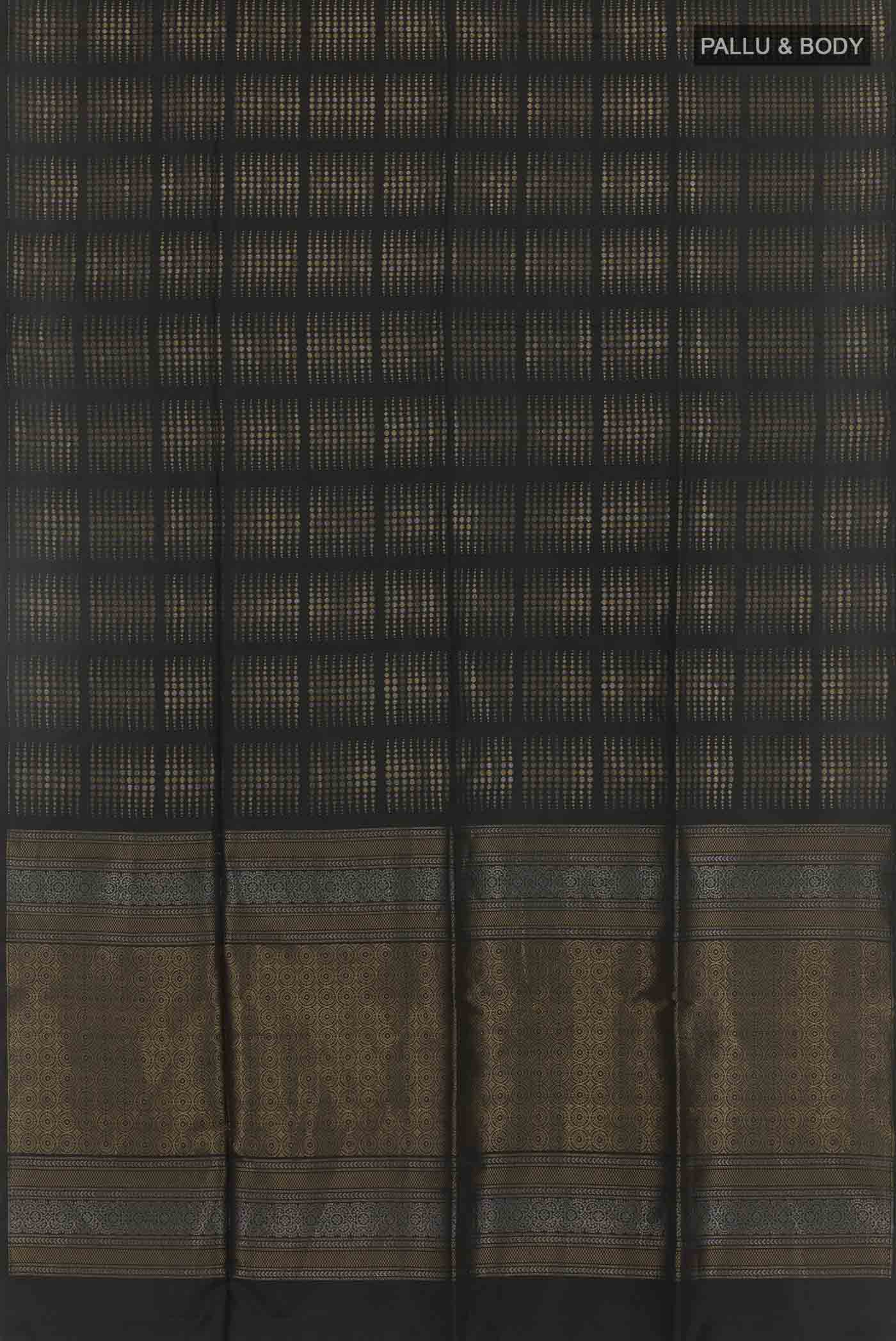 Flat view of Black Soft Silk Saree with Zari Butta on the body and Zari Border. 