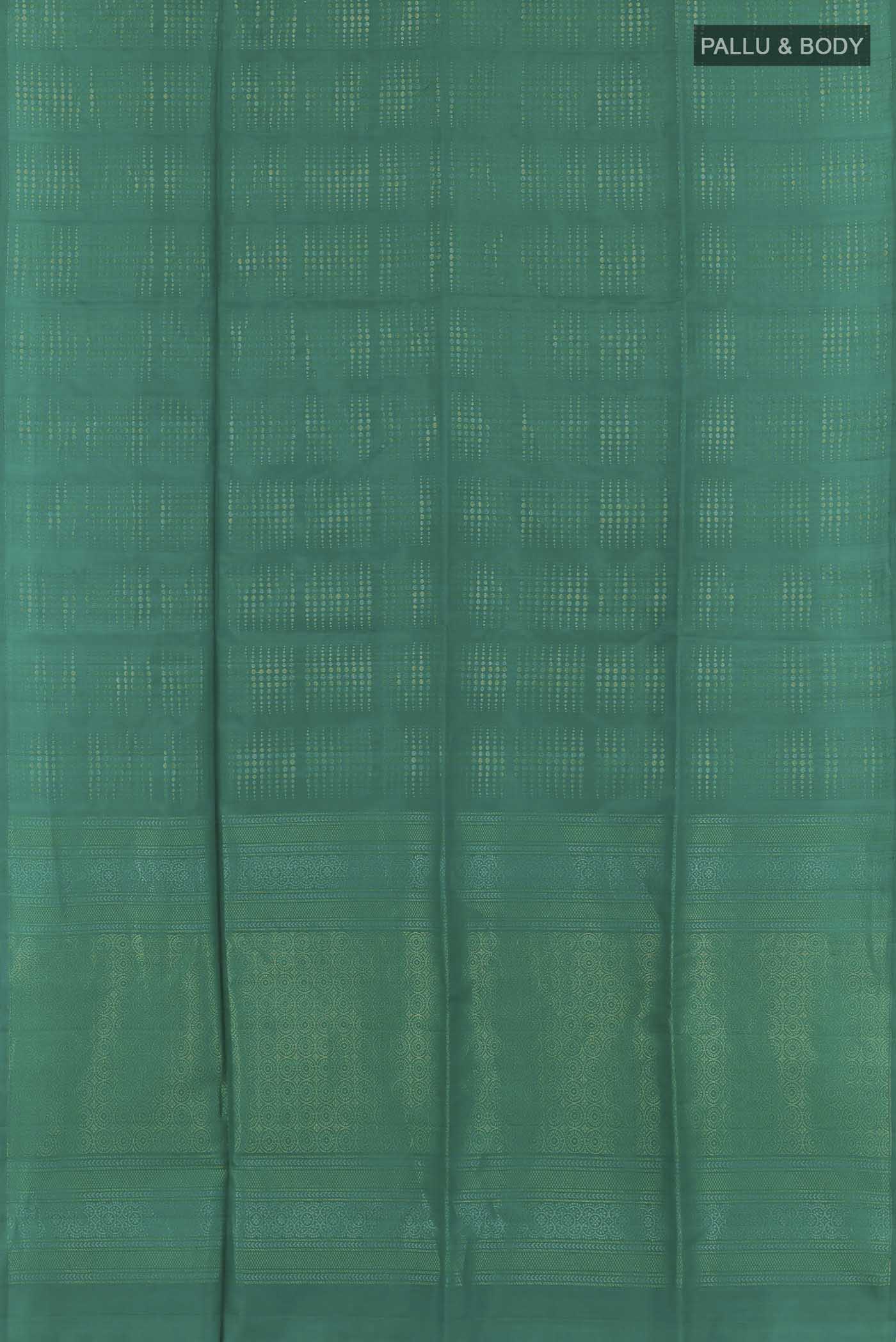 Flat view of Sea Green Soft Silk Saree with Zari Butta on the body and Zari Border. 