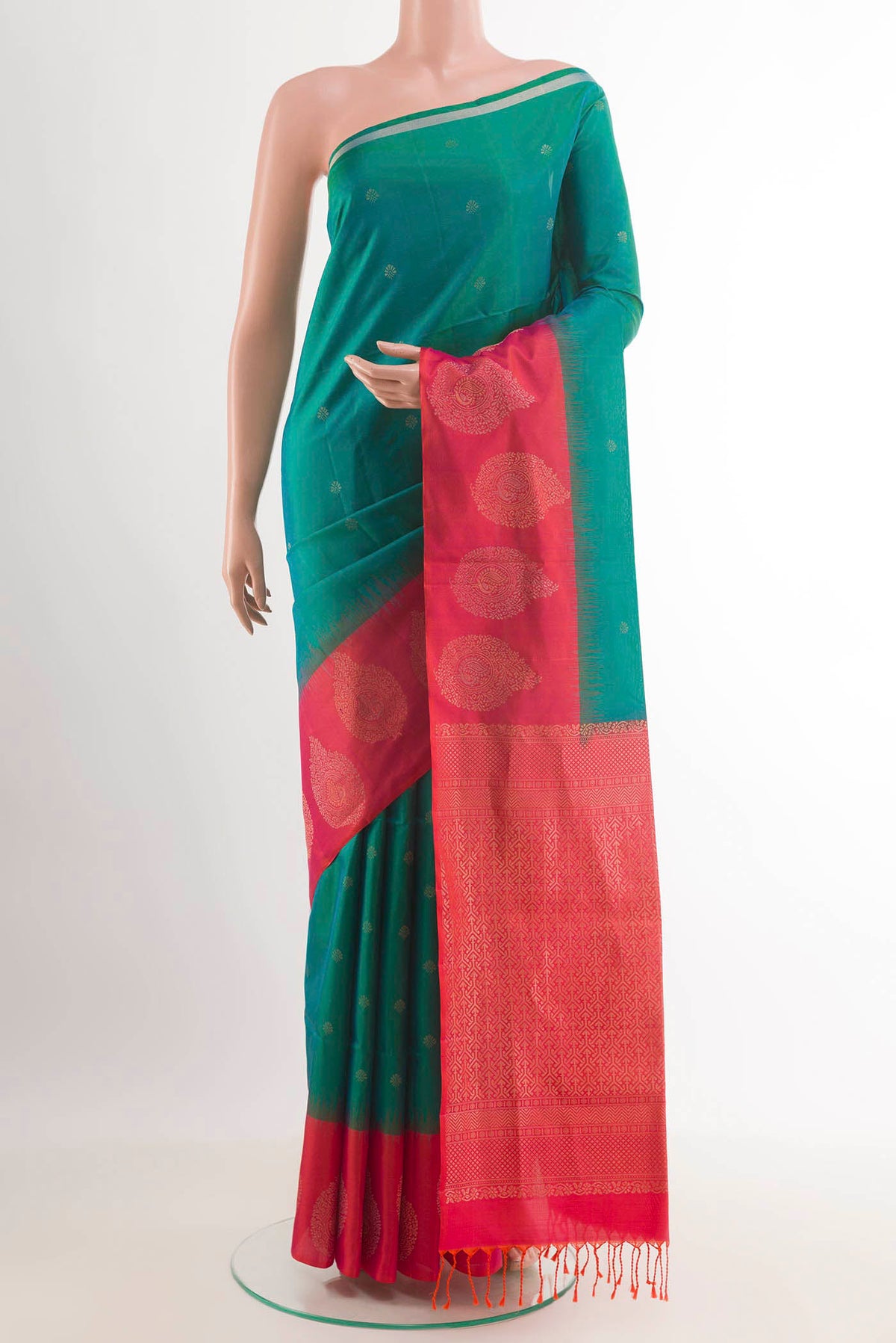 Sea Green Dual Tone Soft Silk Saree with Zari Butta on the body and Zari Border.  displayed on a mannequin