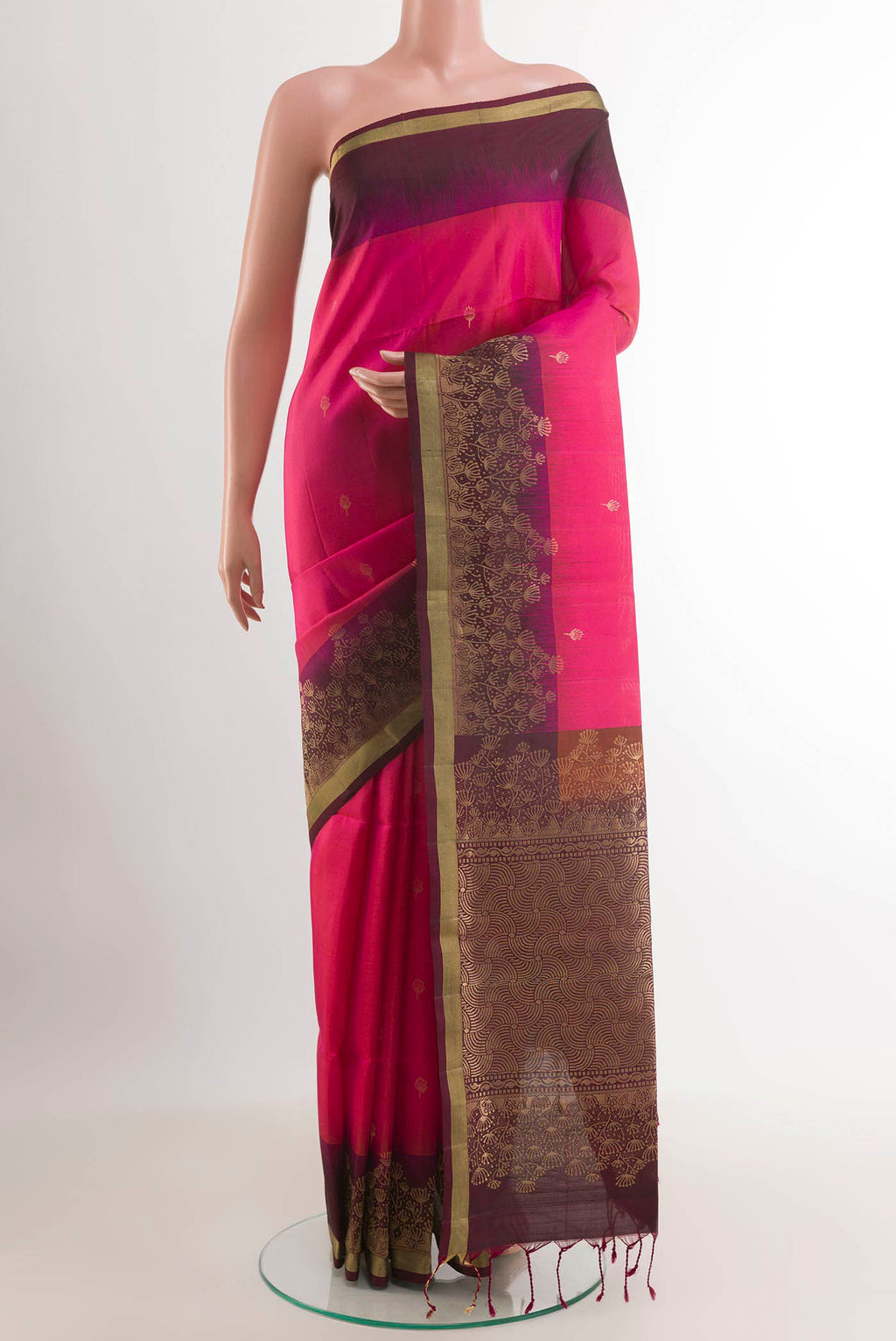 Pink Soft Silk Saree with Zari Butta on the body and Zari Border.  displayed on a mannequin
