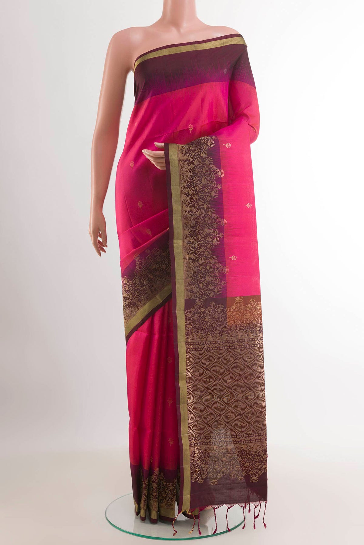 Pink Soft Silk Saree with Zari Butta on the body and Zari Border.  displayed on a mannequin