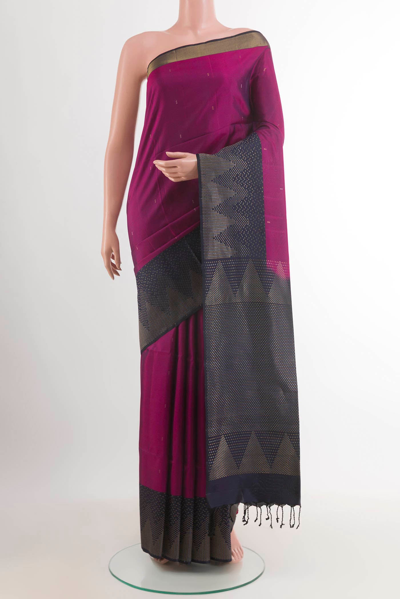 Purple Soft Silk Saree with Zari Butta on the body and Zari Border.  displayed on a mannequin