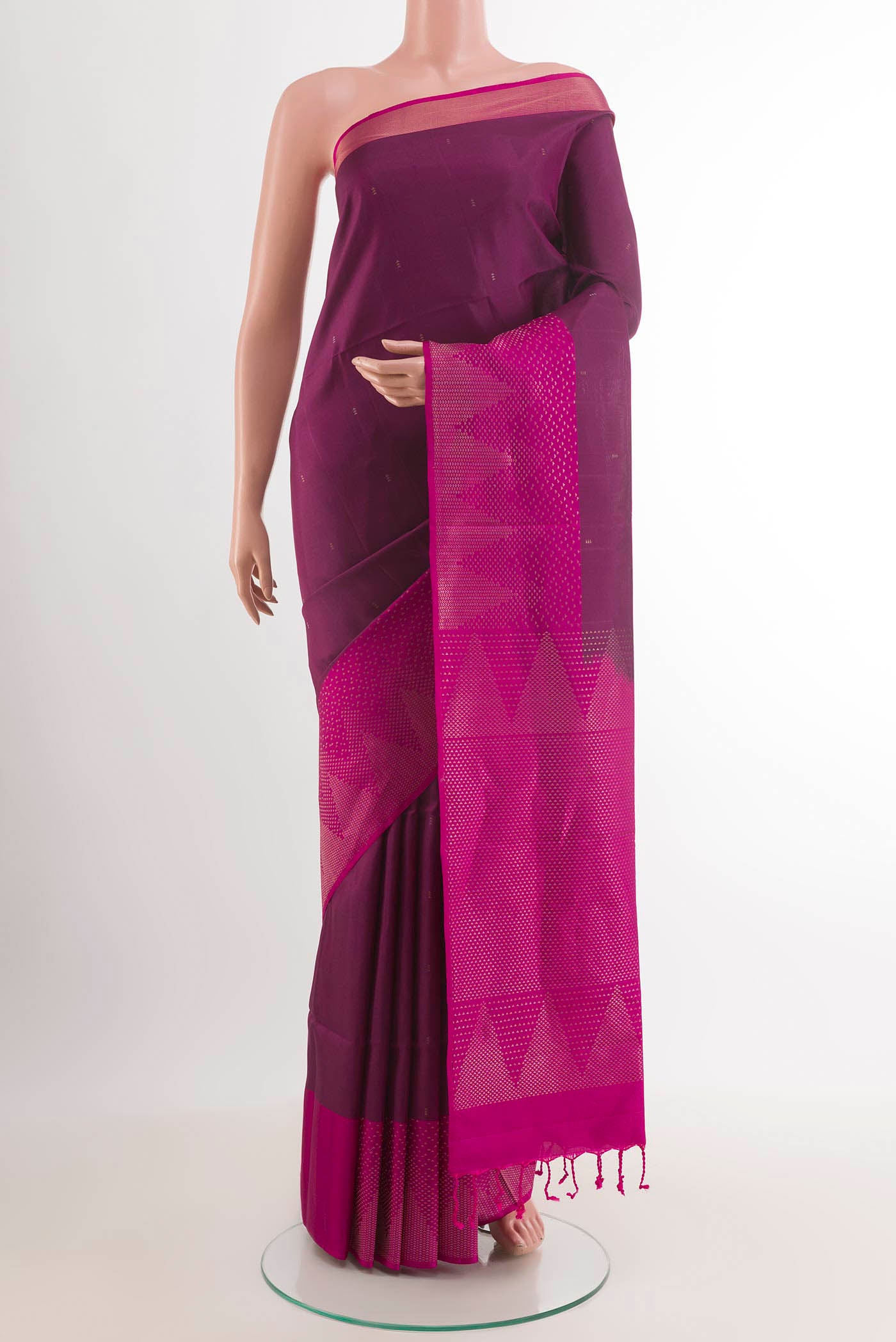 Purple Soft Silk Saree with Zari Butta on the body and Zari Border.  displayed on a mannequin