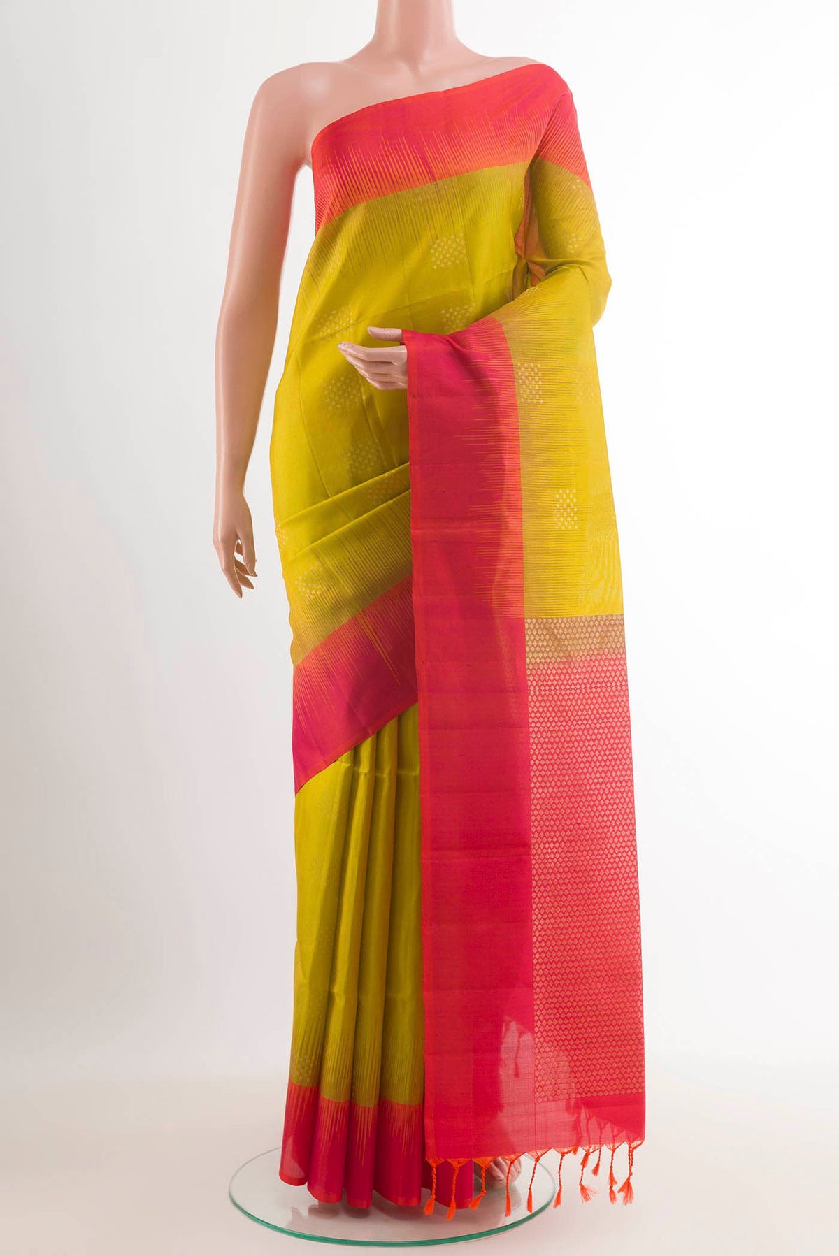 Lemon Yellow Dual Tone Soft Silk Saree with Zari Butta on the body and Zari Border.  displayed on a mannequin