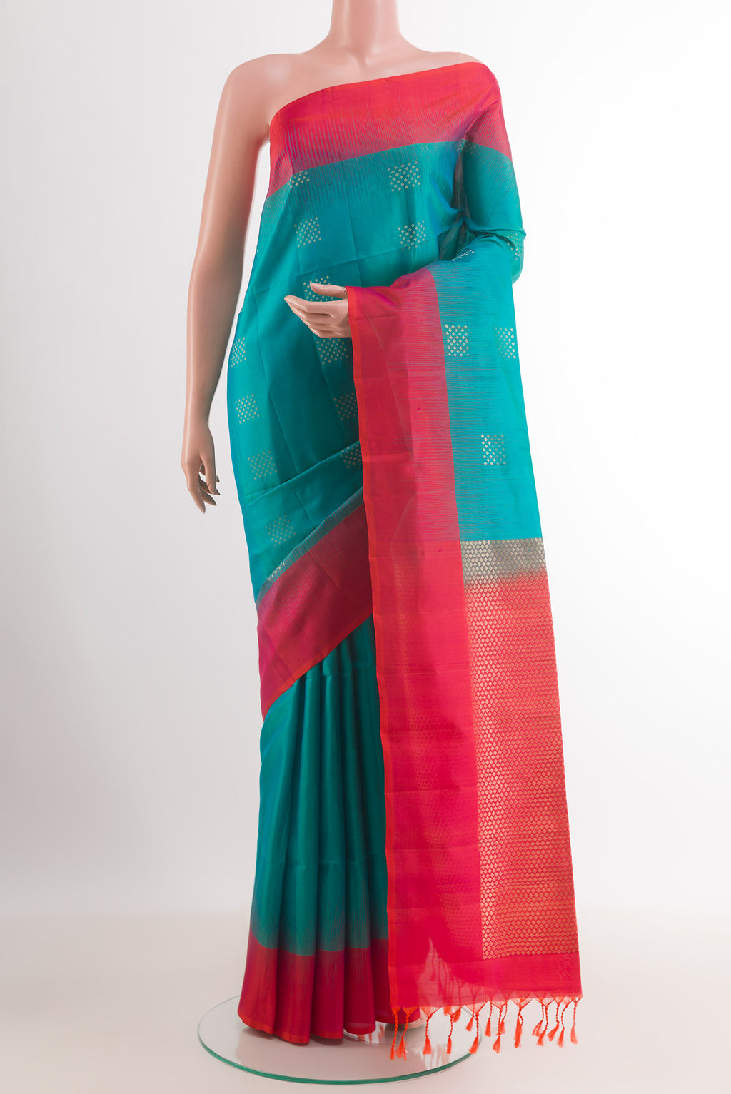 Blue Dual Tone Soft Silk Saree with Zari Butta on the body and Zari Border.  displayed on a mannequin