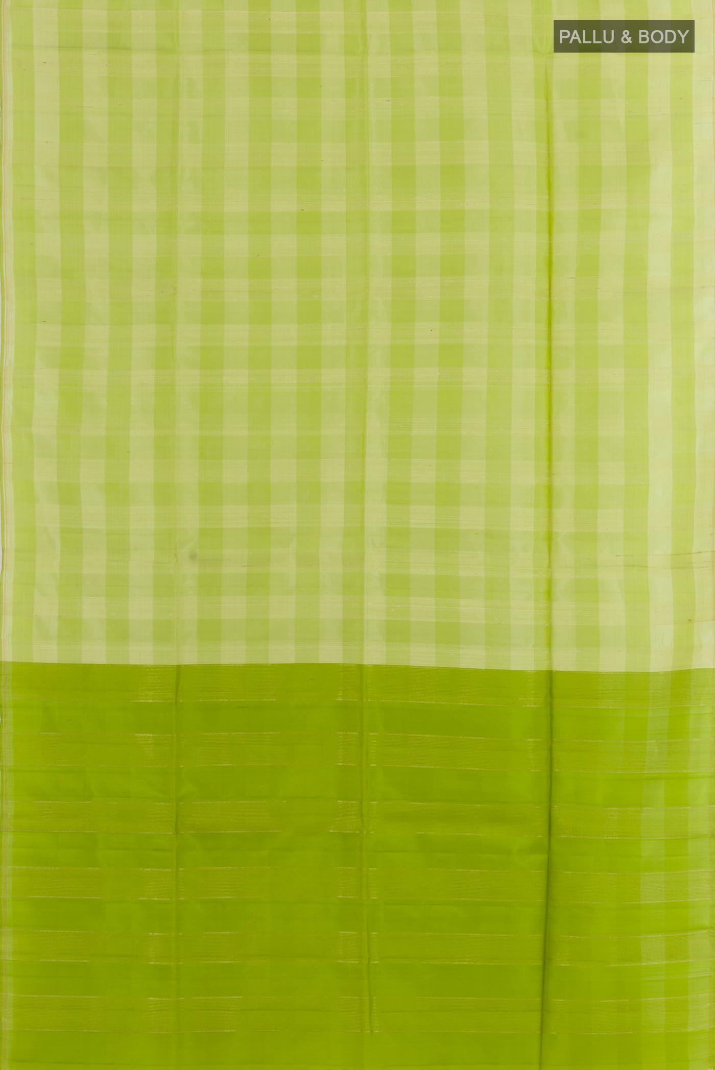 Flat view of Light Green Soft Silk Saree with Checked design on the body and Zari Border. 