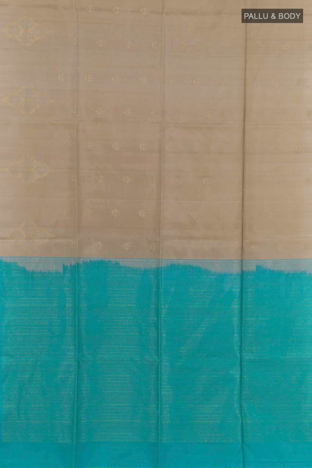 Flat view of Grey Soft Silk Saree with Zari Butta on the body and Zari Border. 