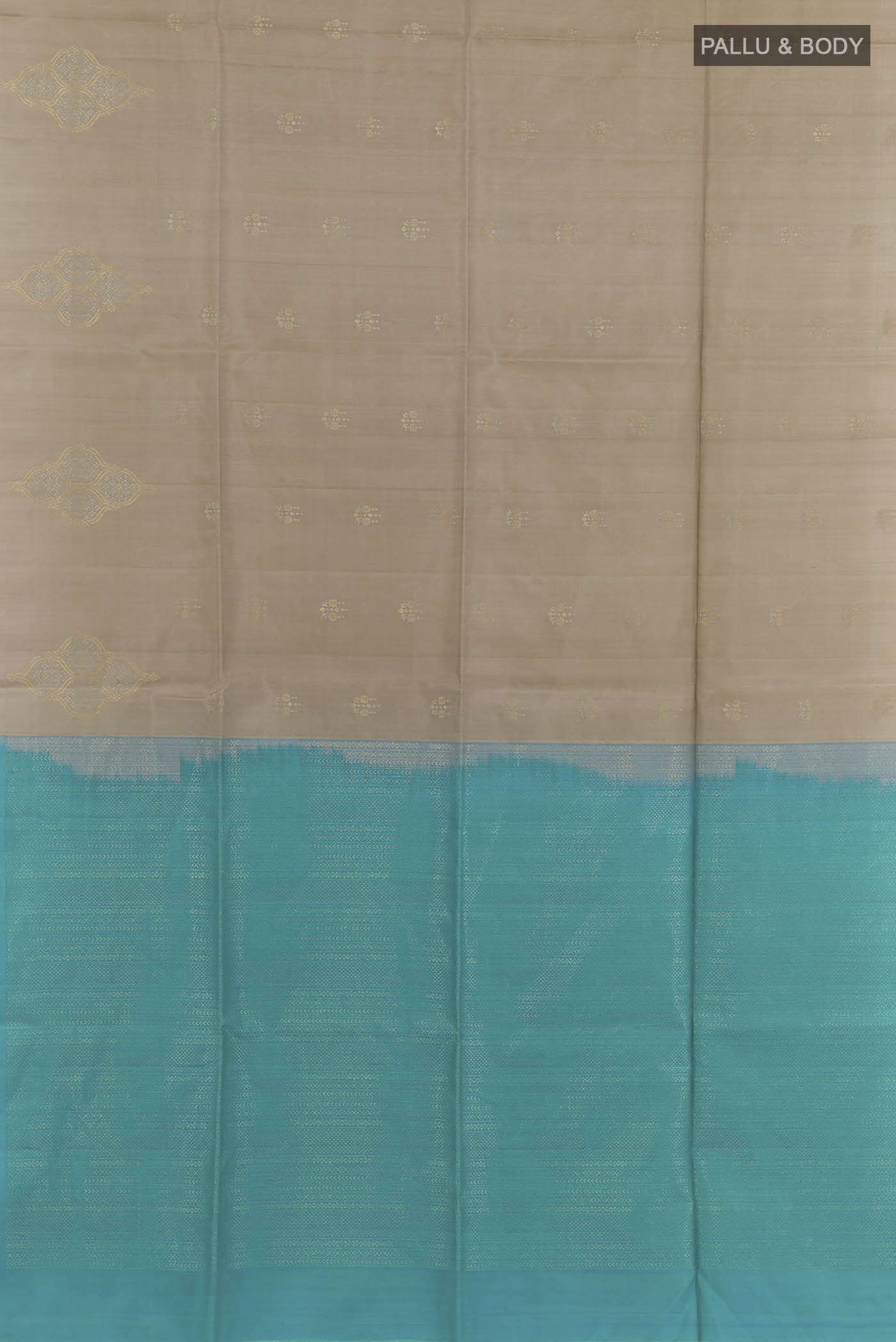 Flat view of Grey Soft Silk Saree with Zari Butta on the body and Zari Border. 