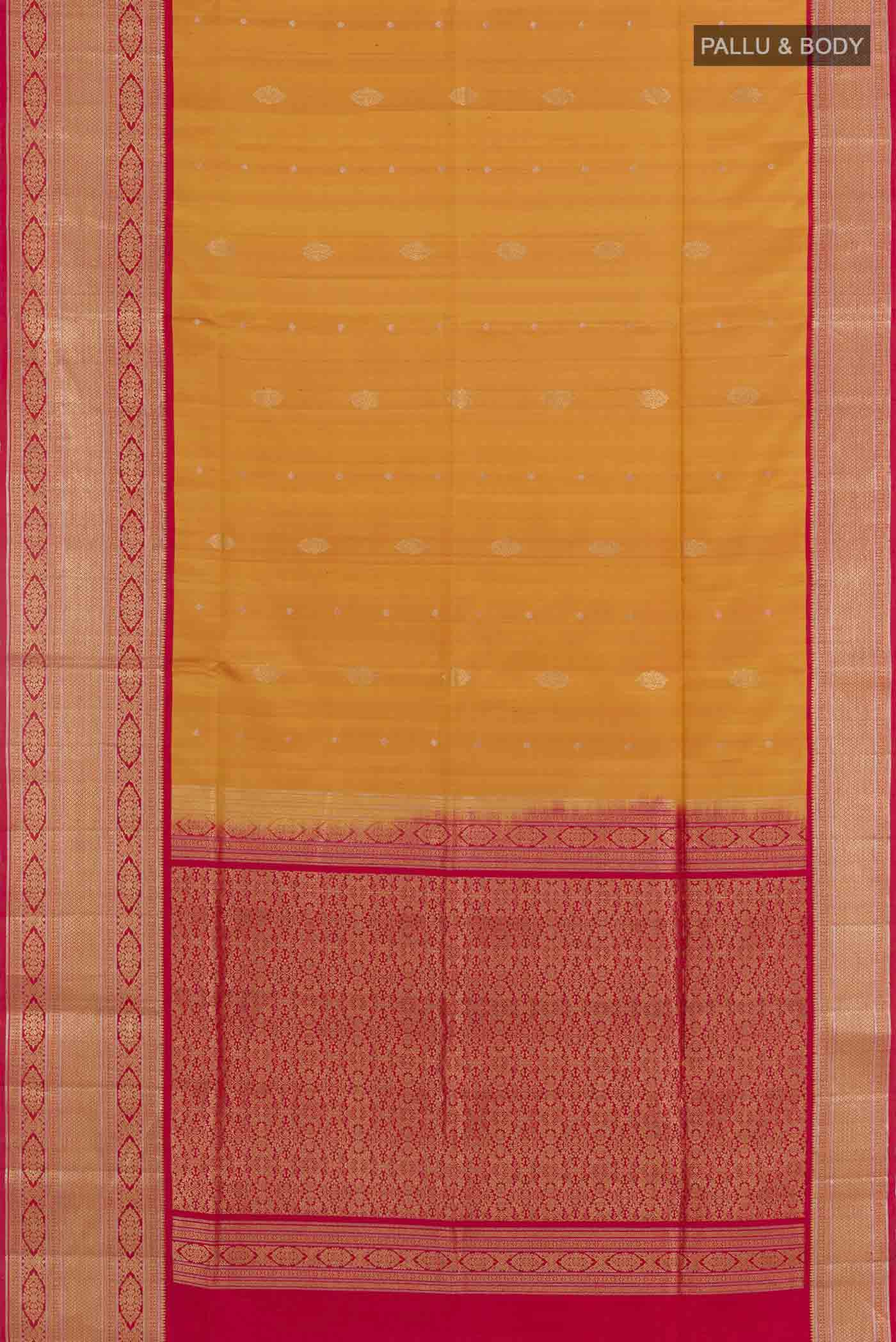 Flat view of Mustard Soft Silk Saree with Zari Butta on the body and Zari Border. 