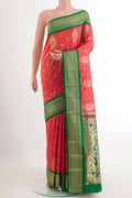 Pink Soft Silk Saree with Zari Butta on the body and Zari Border.  displayed on a mannequin
