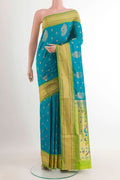 Blue Soft Silk Saree with Zari Butta on the body and Zari Border.  displayed on a mannequin
