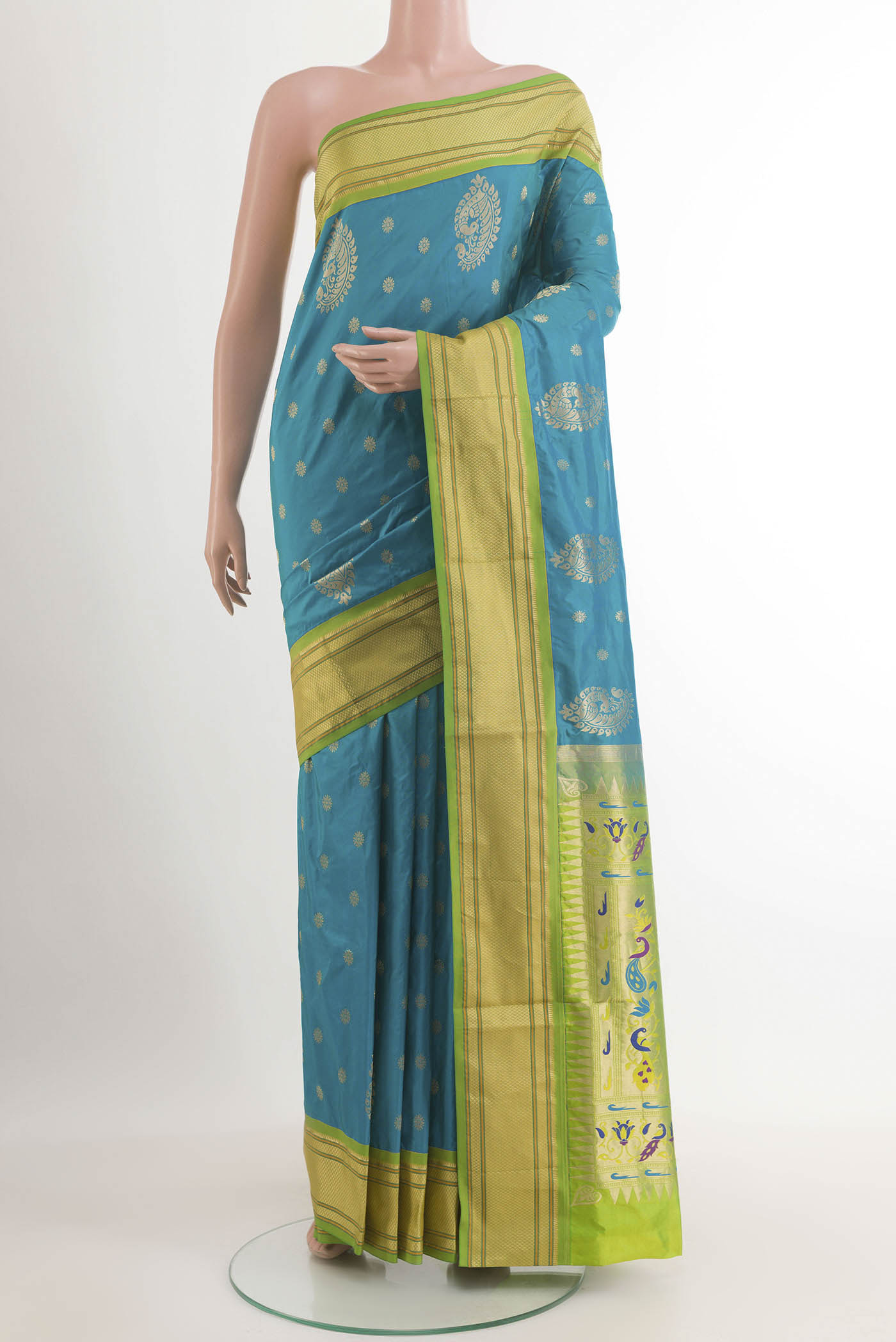 Blue Soft Silk Saree with Zari Butta on the body and Zari Border.  displayed on a mannequin