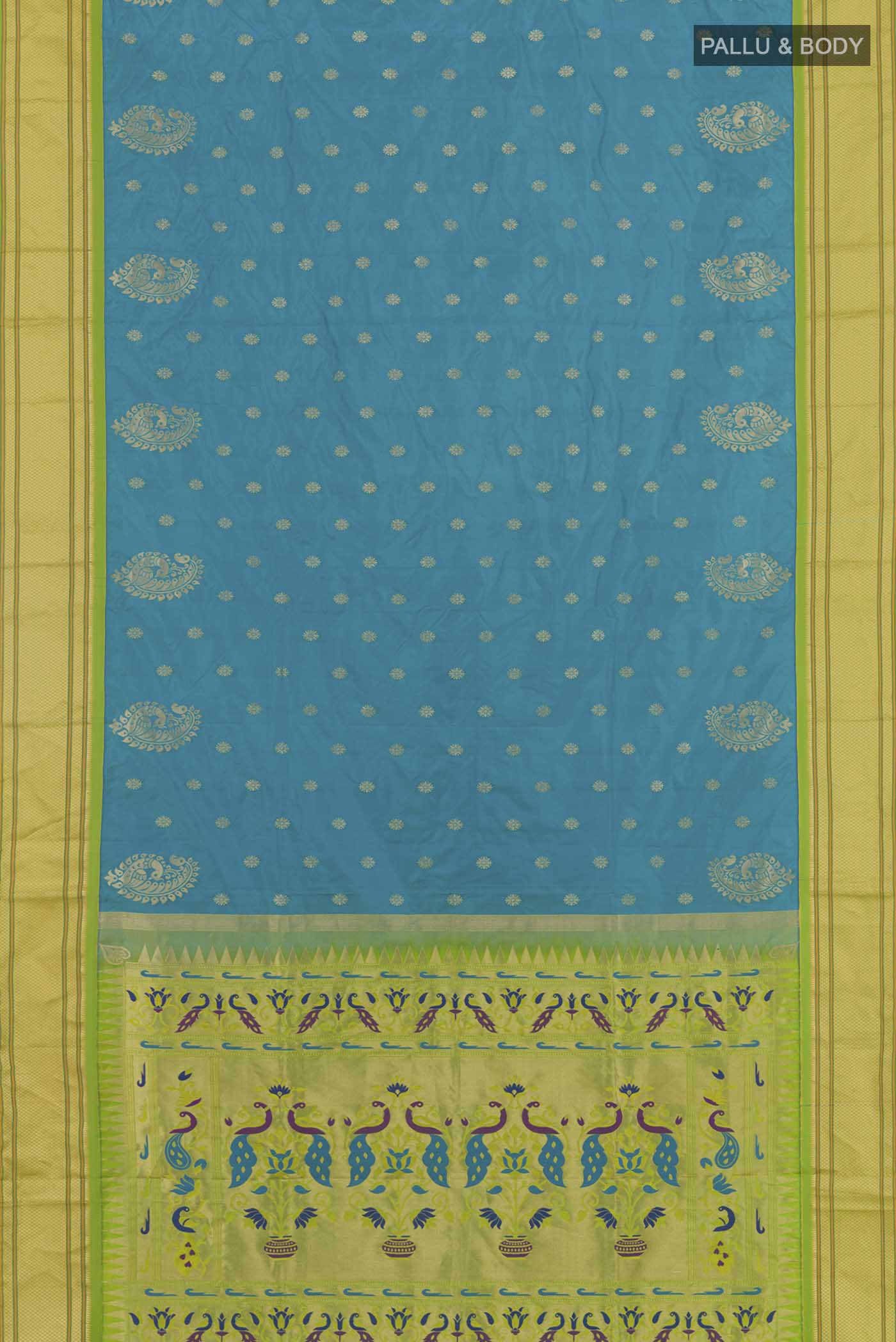 Flat view of Blue Soft Silk Saree with Zari Butta on the body and Zari Border. 