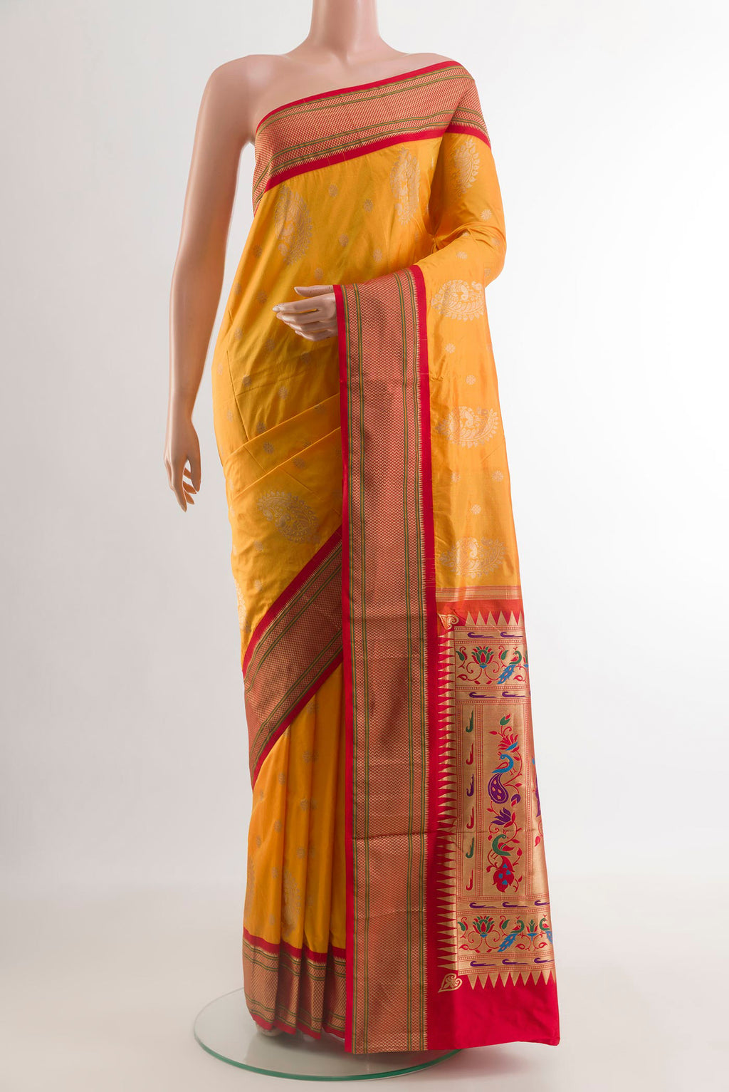 Yellow Paithani Silk Saree with Zari Butta on the body and Zari Border.  displayed on a mannequin
