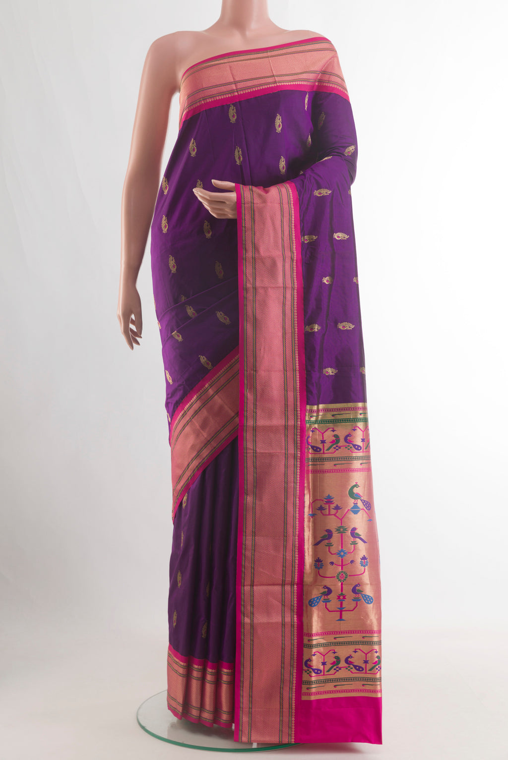 Purple Paithani Silk Saree with Zari Butta on the body and Zari Border.  displayed on a mannequin