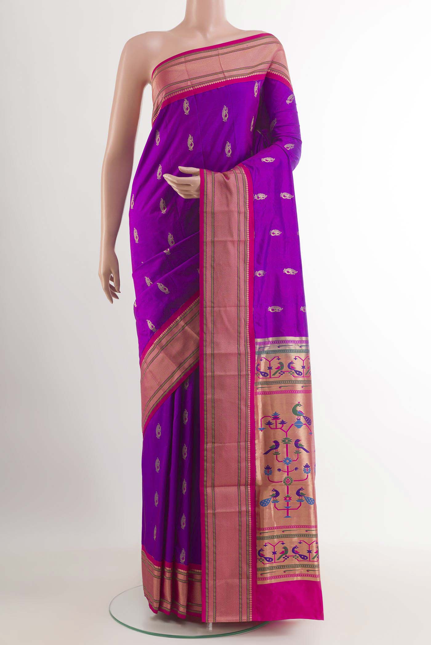 Purple Soft Silk Saree with Zari Butta on the body and Zari Border.  displayed on a mannequin