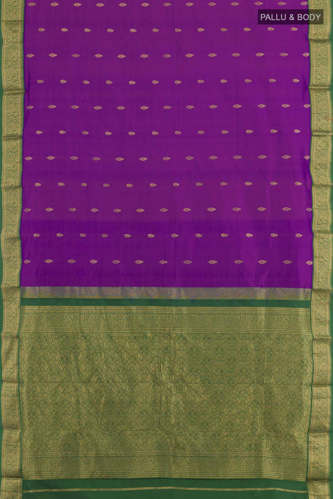 Flat view of Purple Kanchipuram Silk Saree with Zari Butta on the body and Zari Border. 