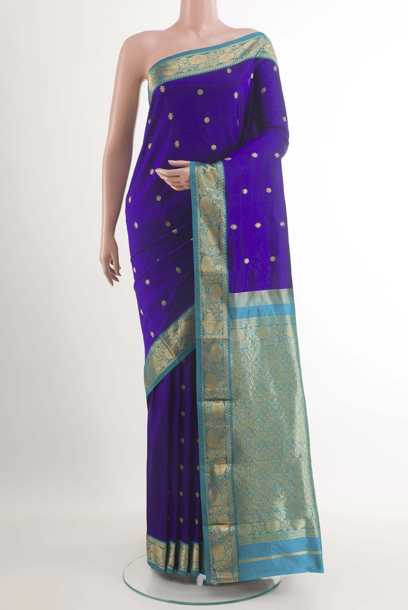 Dark Blue Kanchipuram Silk Saree with Zari Brocade on the body and Zari Border.  displayed on a mannequin