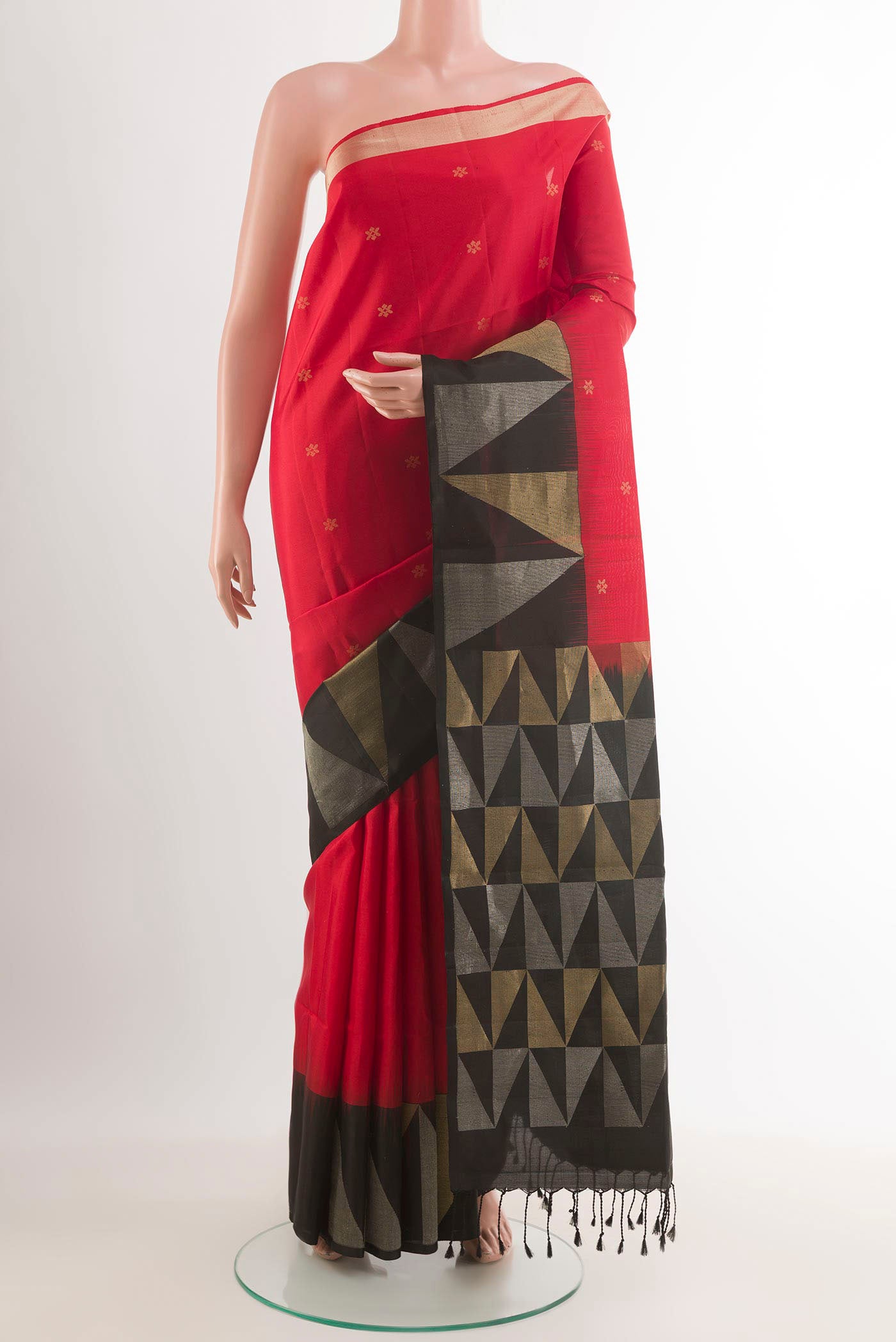 Red Soft Silk Saree with Zari Butta on the body and Zari Border.  displayed on a mannequin