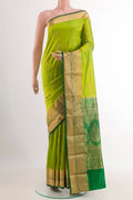 Light Green Dual Tone Kanchipuram Silk Saree with Zari Butta on the body and Zari Border.  displayed on a mannequin