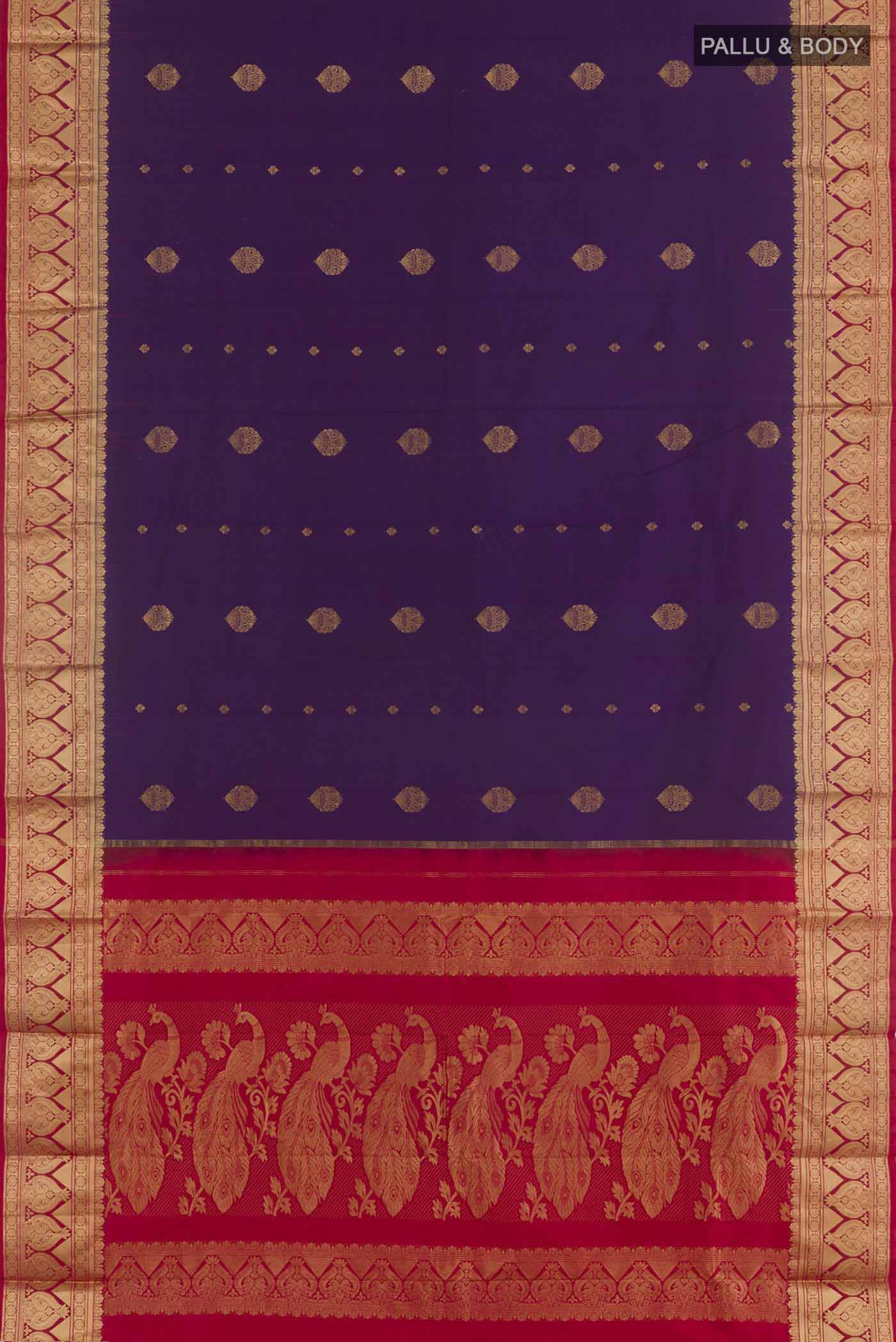 Flat view of Purple Kanchipuram Silk Saree with Zari Butta on the body and Zari Border. 