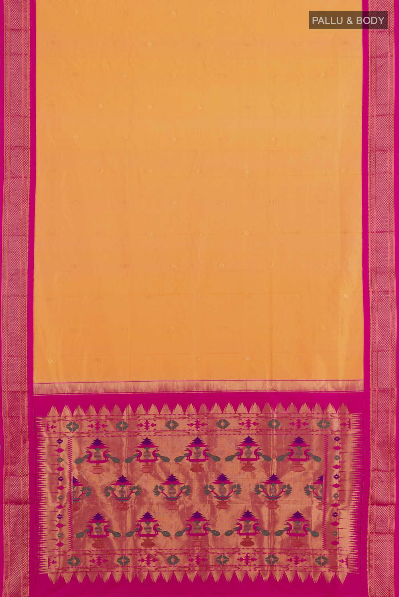 Flat view of Orange Soft Silk Saree with Zari Butta on the body and Zari Border. 