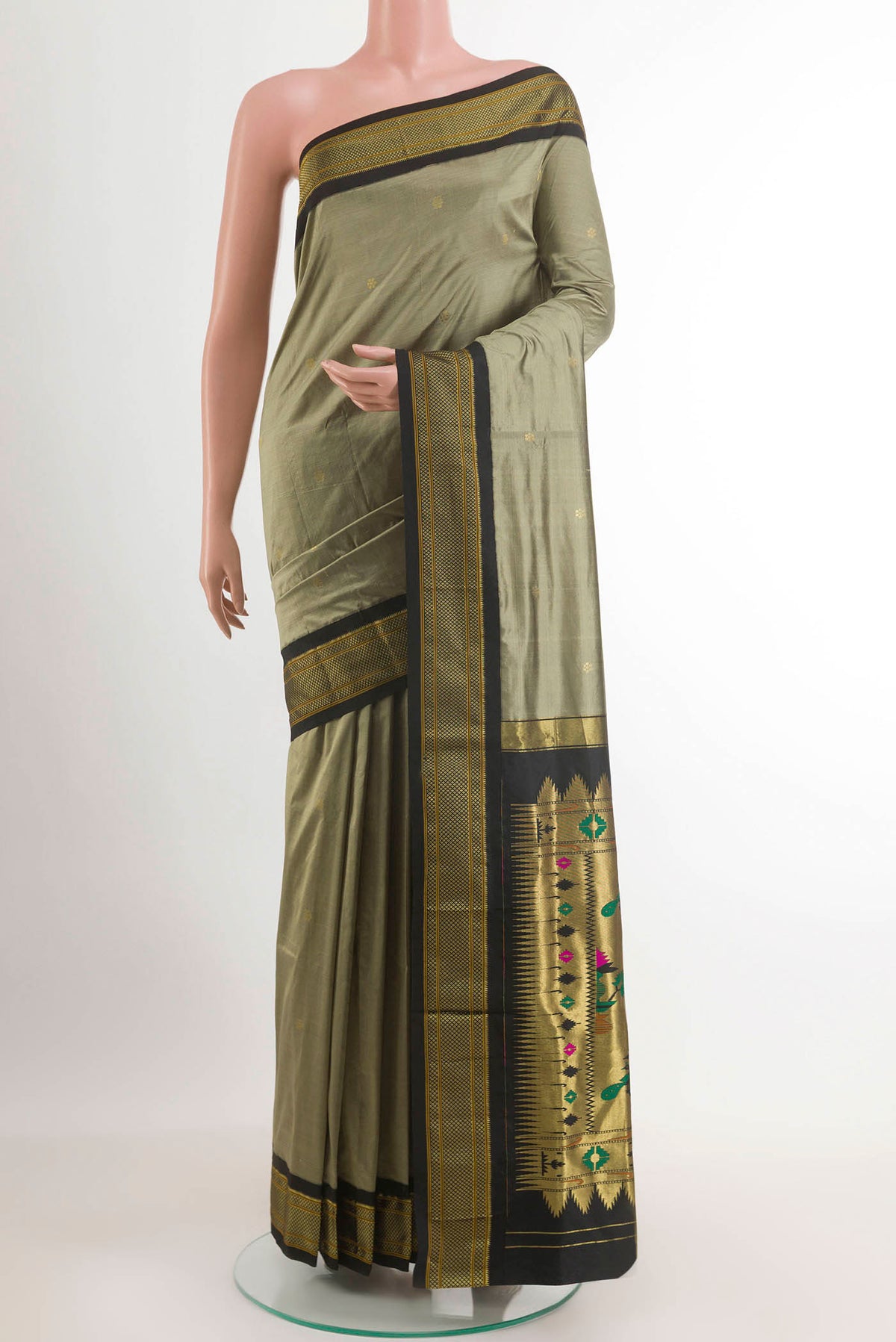 Davys Grey Soft Silk Saree with Zari Butta on the body and Zari Border.  displayed on a mannequin