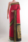 Red Paithani Silk Saree with Zari Butta on the body and Zari Border.  displayed on a mannequin