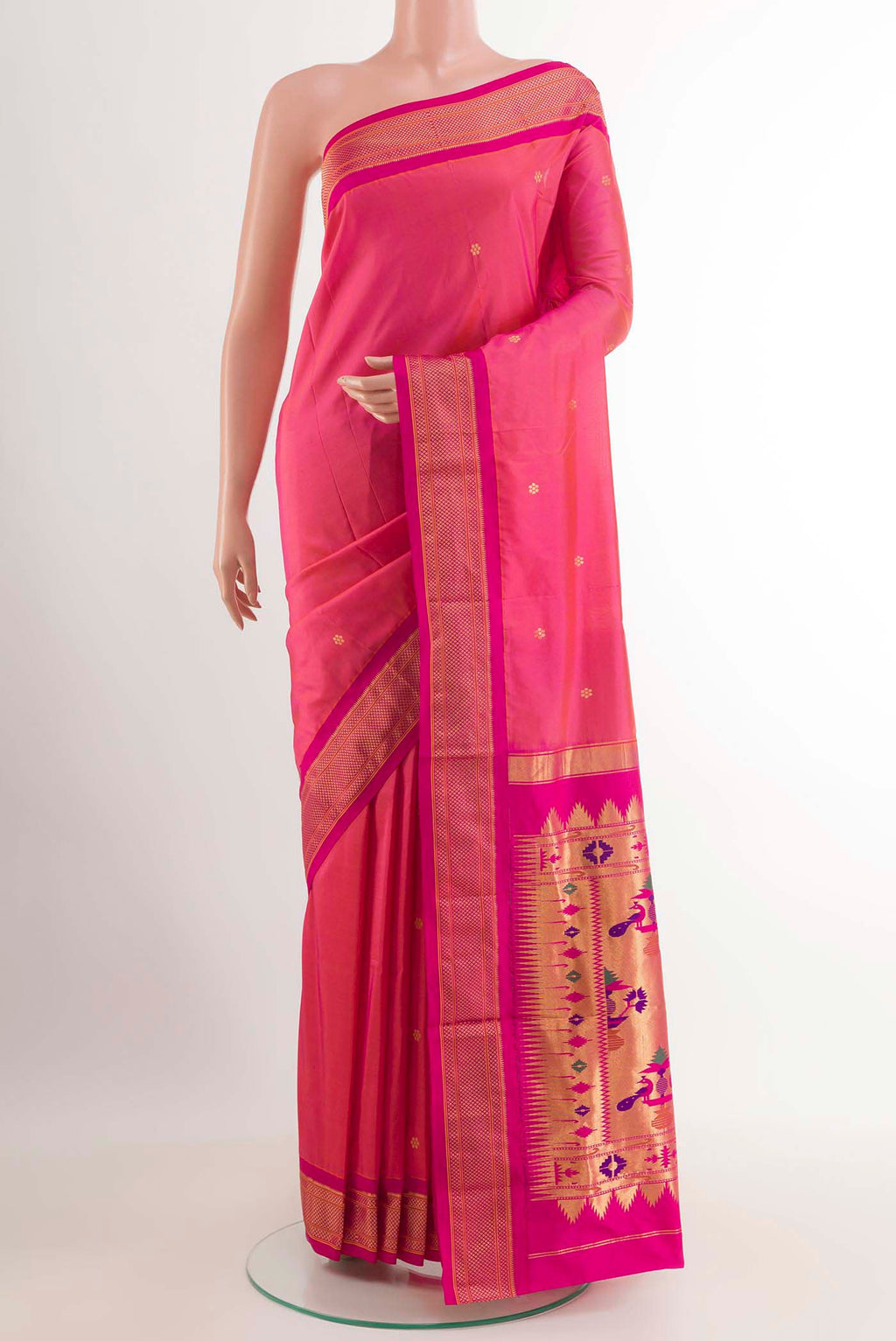 Pink Soft Silk Saree with Zari Butta on the body and Zari Border.  displayed on a mannequin