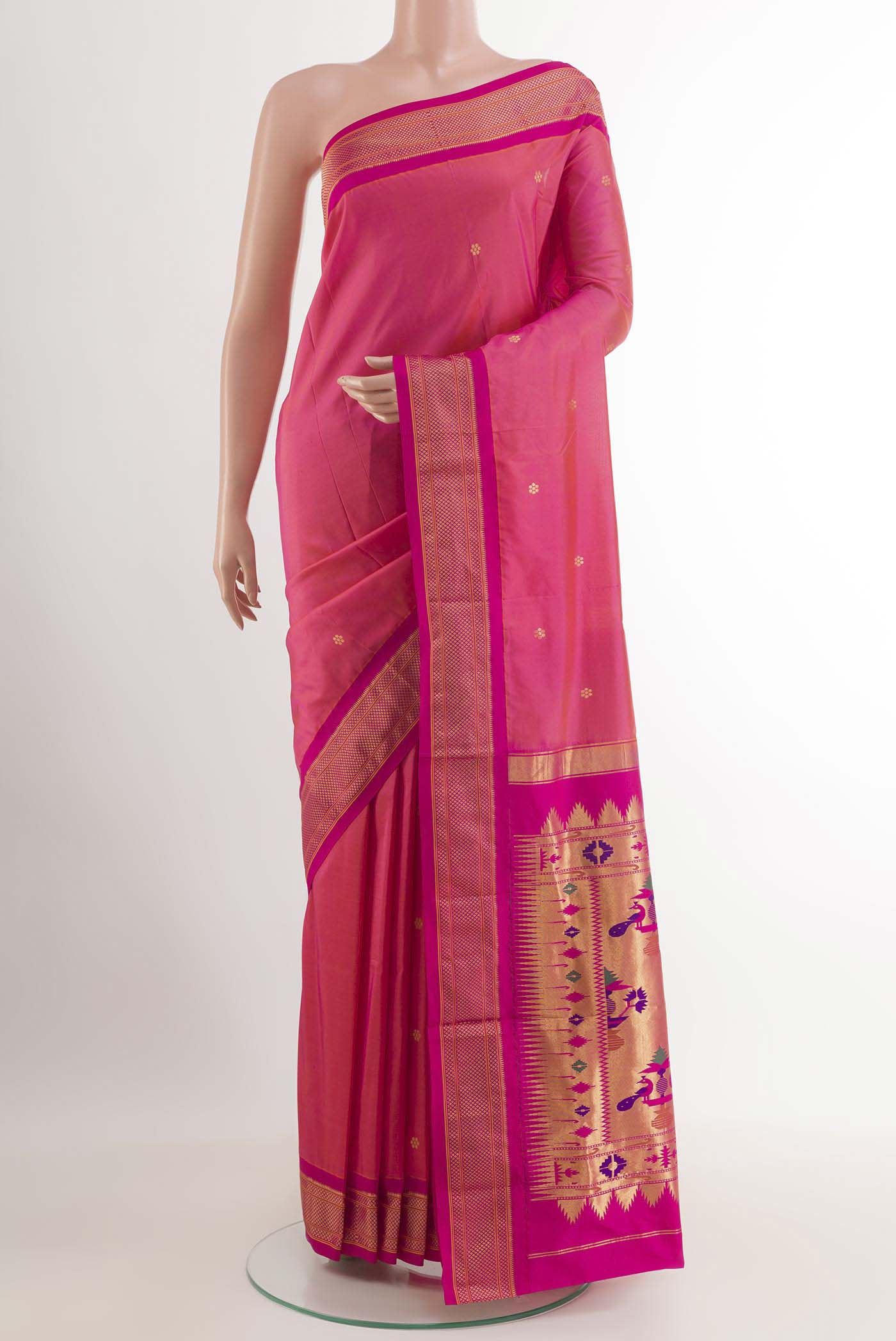 Pink Soft Silk Saree with Zari Butta on the body and Zari Border.  displayed on a mannequin