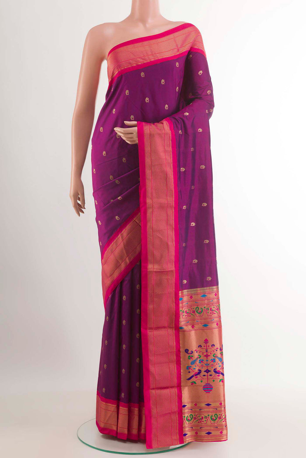 Purple Soft Silk Saree with Zari Butta on the body and Zari Border.  displayed on a mannequin