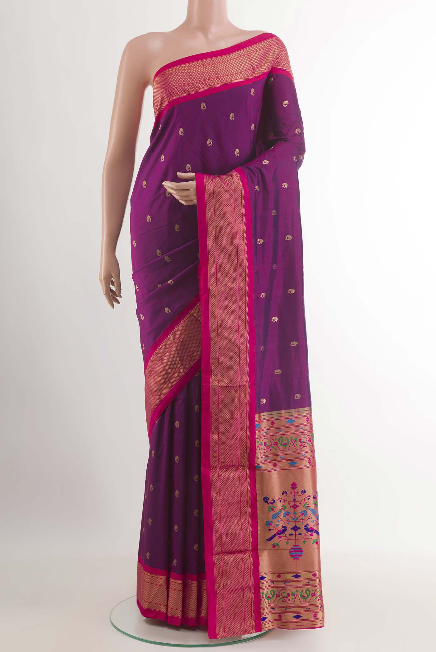 Purple Soft Silk Saree with Zari Butta on the body and Zari Border.  displayed on a mannequin