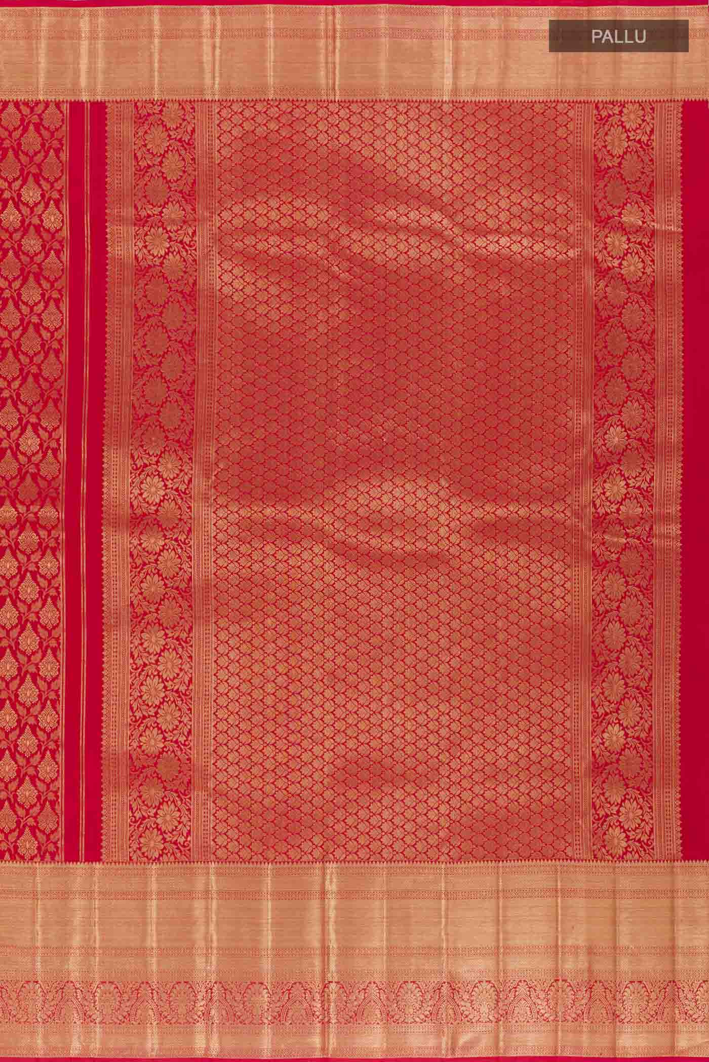 Close up image of the pallu of Red Kanchipuram Silk Saree with Zari Brocade on the body and Zari Border. 