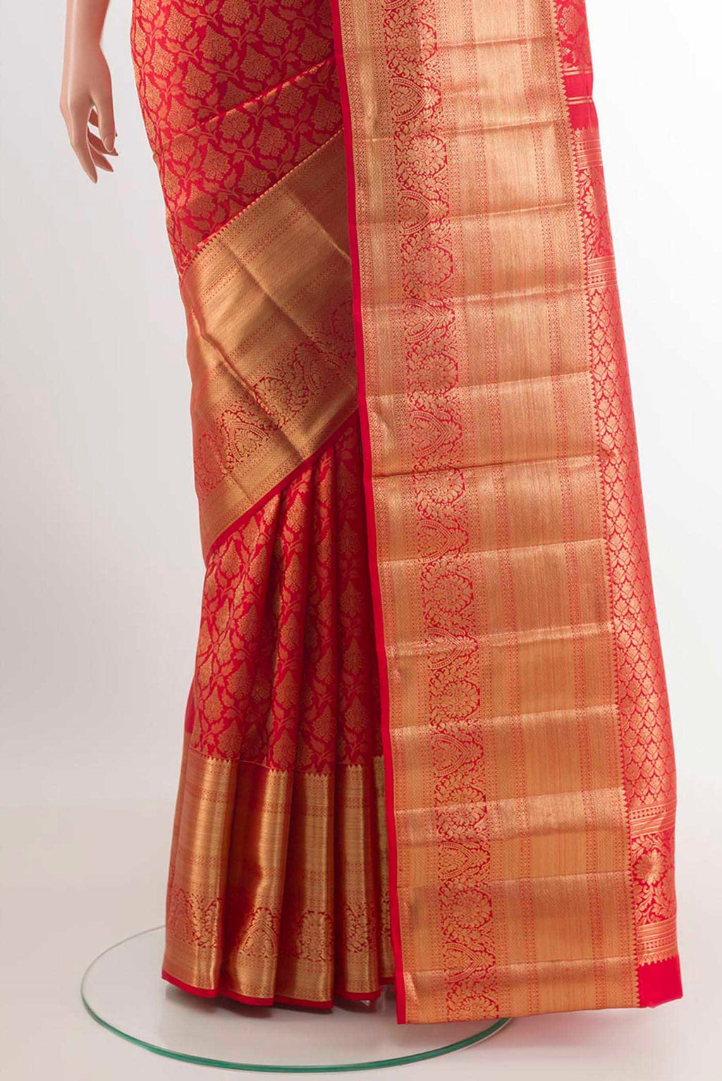 Pleats and pallu of Red Kanchipuram Silk Saree with Zari Brocade on the body and Zari Border. 