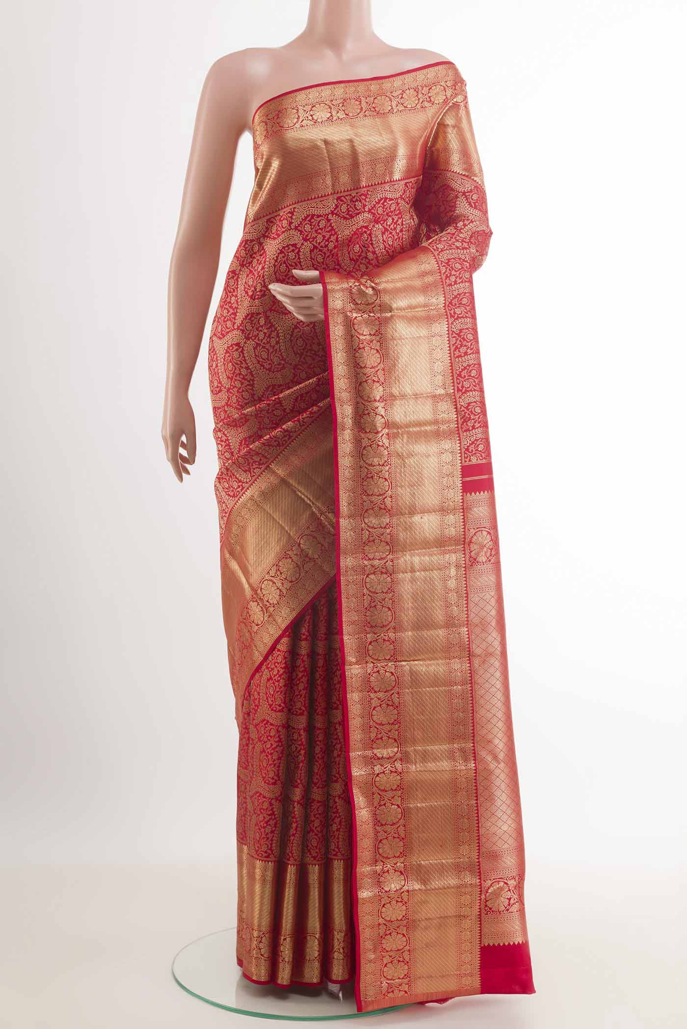 Red Dual Tone Kanchipuram Silk Saree with Zari Brocade on the body and Zari Border.  displayed on a mannequin