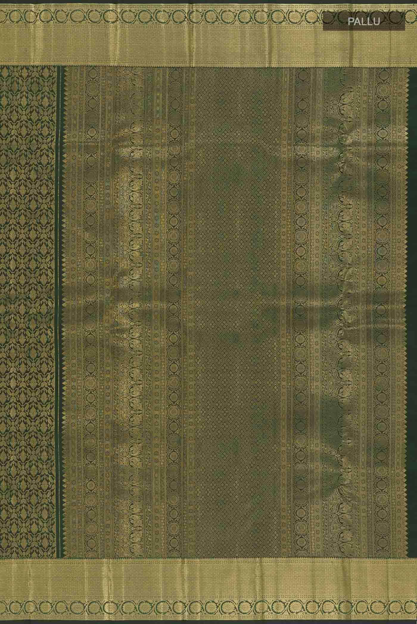 Close up image of the pallu of Bottle Green Kanchipuram Silk Saree with Zari Brocade on the body and Zari Border. 
