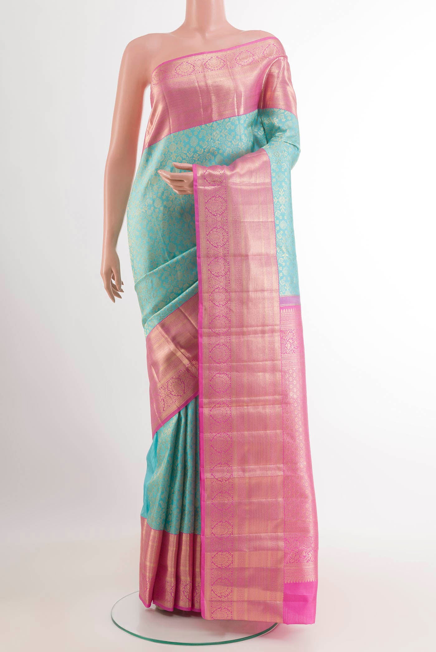 Blue Kanchipuram Silk Saree with Zari Brocade on the body and Zari Border.  displayed on a mannequin