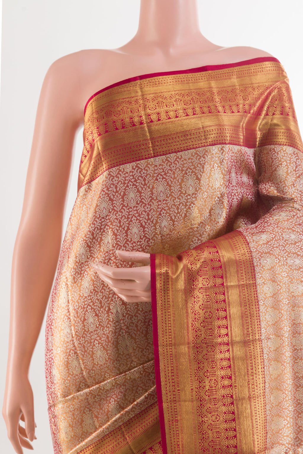 Border image of Golden Peach Kanjivaram Tissue Silk Saree with Zari Brocade on the body and Zari Border. 